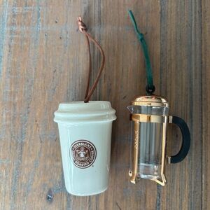 Two Starbucks ornaments- 2011 vintage logo ceramic cup and French press ornament